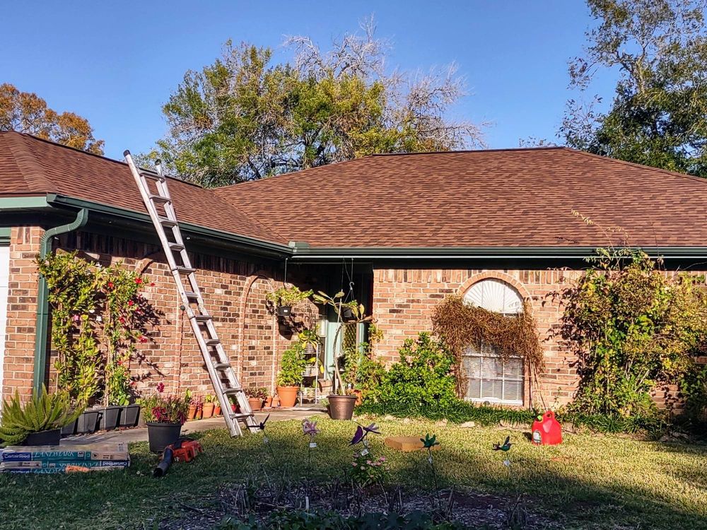 Fresh brown architectural shingle roof on a Houston brick ranch home